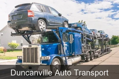 Duncanville Auto Transport carrier loading a vehicle