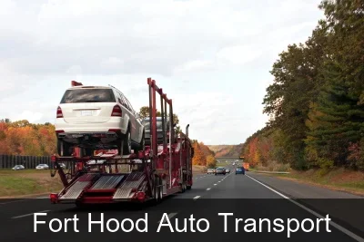 Fort Hood Auto Transport carrier loading a vehicle